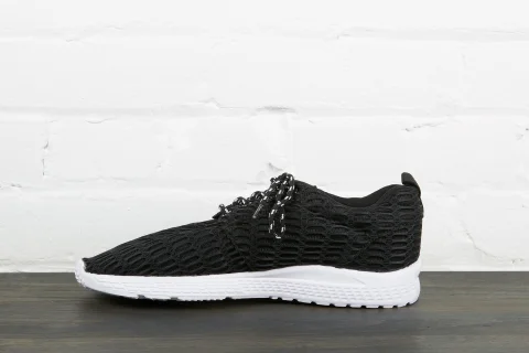 Black sneakers with white sole